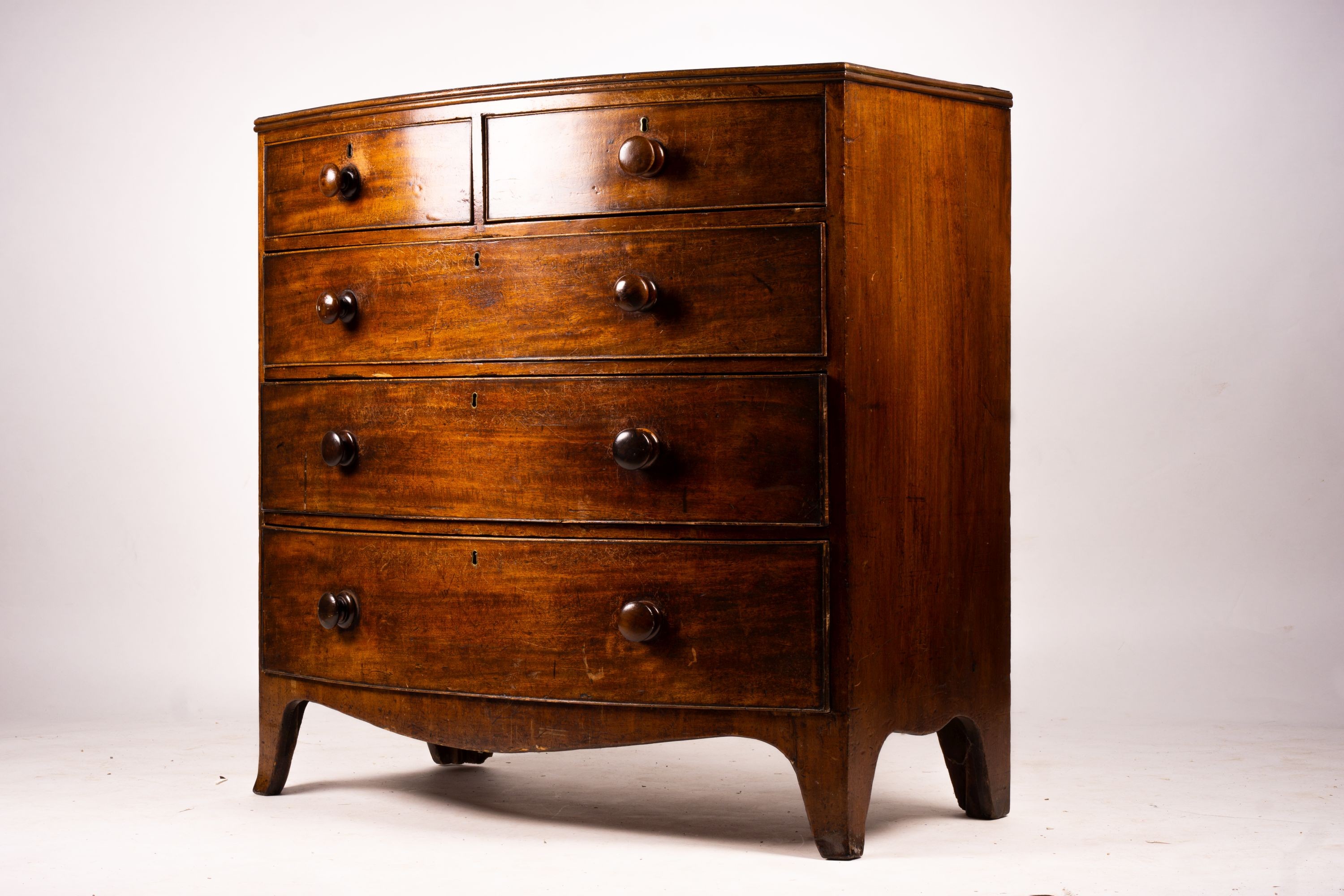 A George IV banded mahogany bowfront chest, width 108cm, depth 57cm, height 105cm